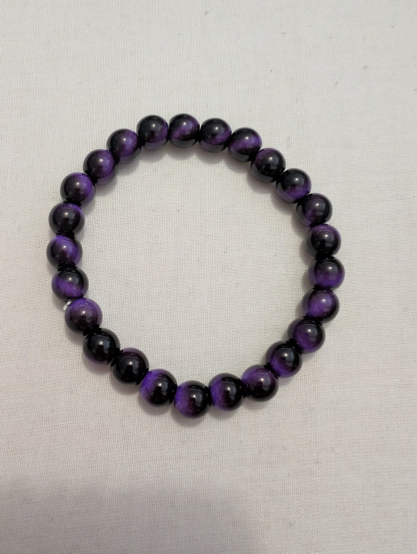 4 purple/black 2 coulerd bead bracelet