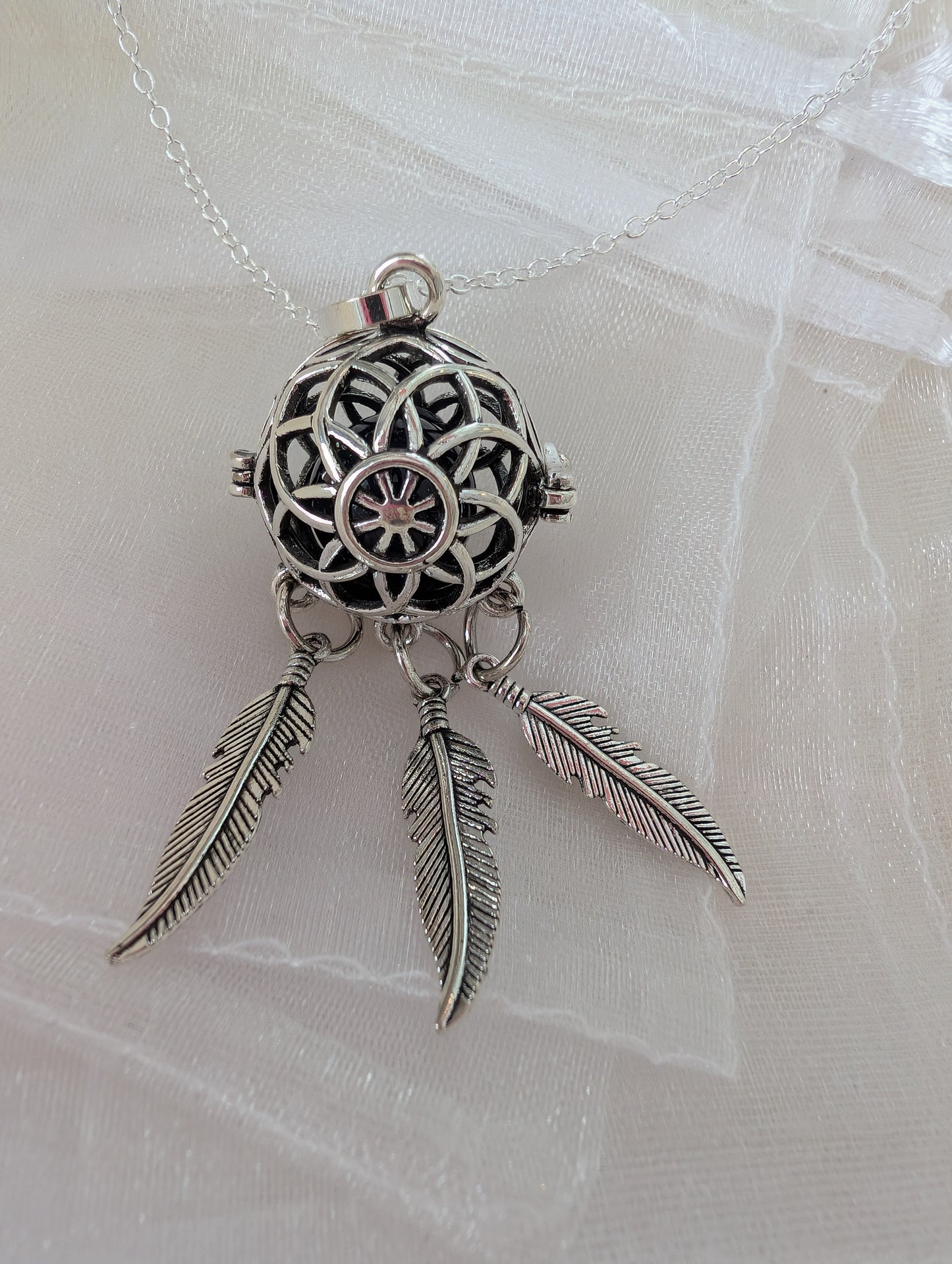 Inside flower dream catcher Bola necklace with black gemstone