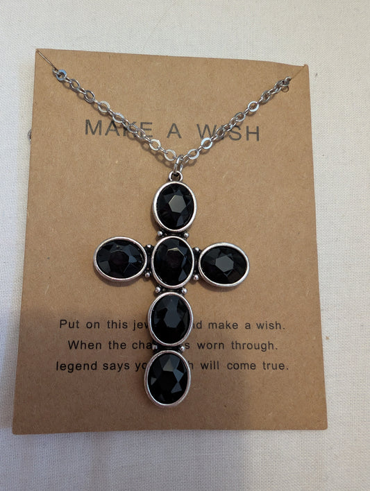 4 black cross necklace meaning
