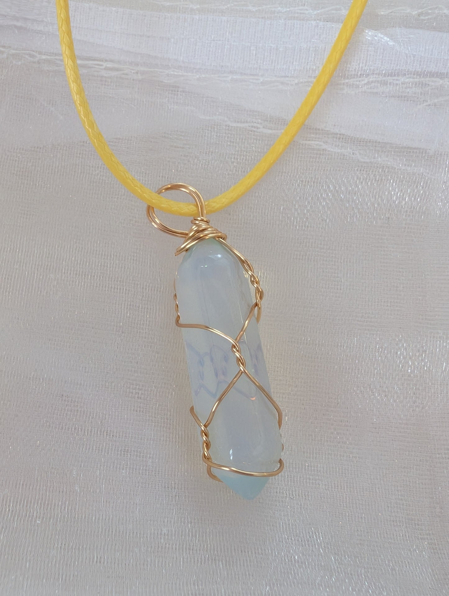 Opel wrap on yellow leatherette necklace