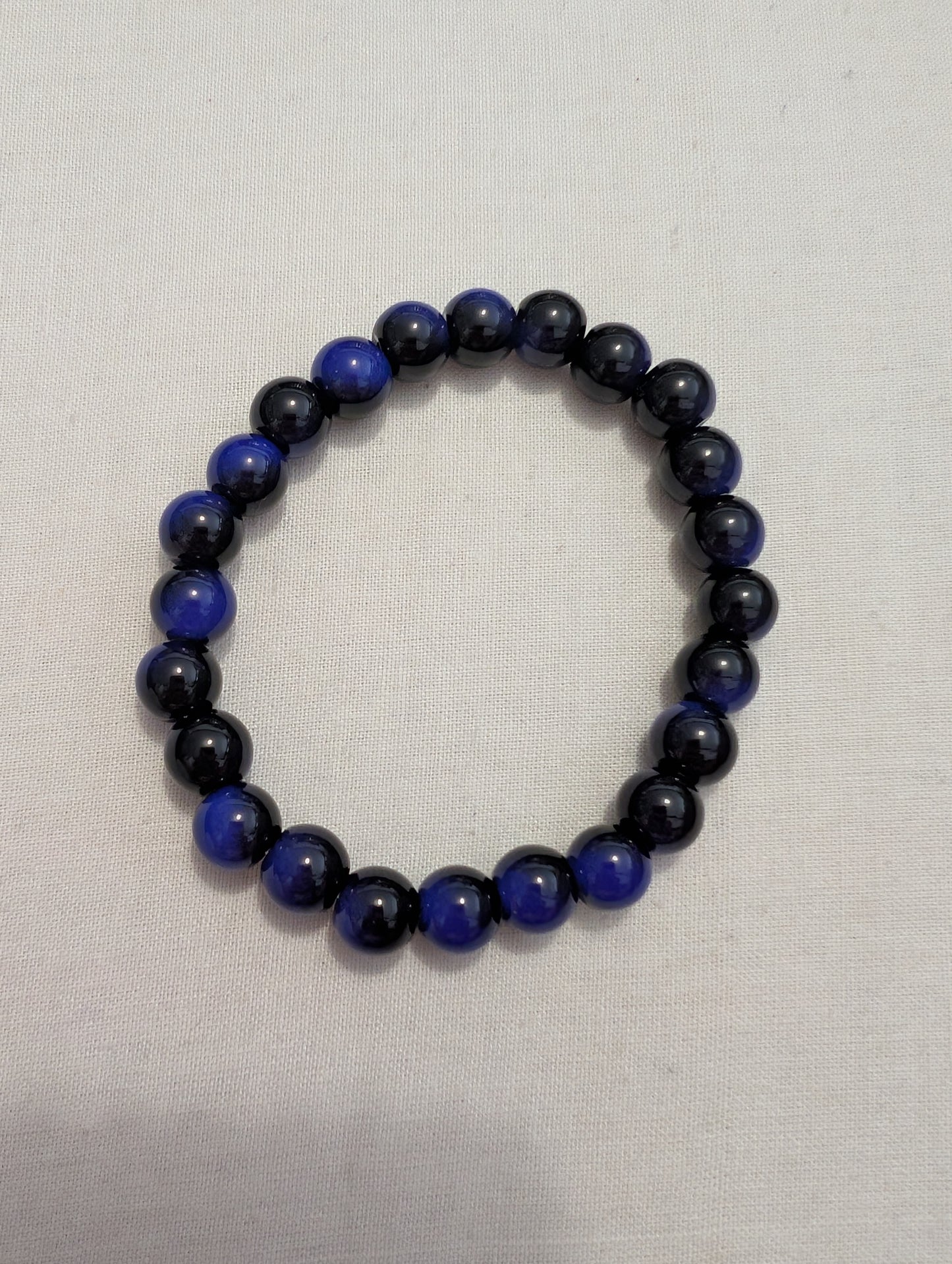 5 blue/black 2 coulerd bead bracelet